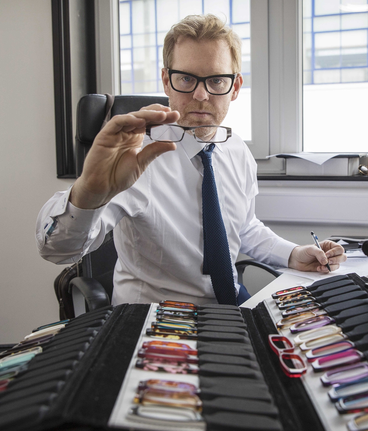 Tom Davies checks each frame individually